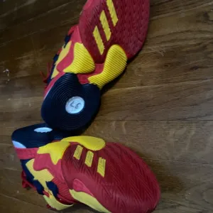 Adidas Red and Yellow Sneakers with Dynamic Design