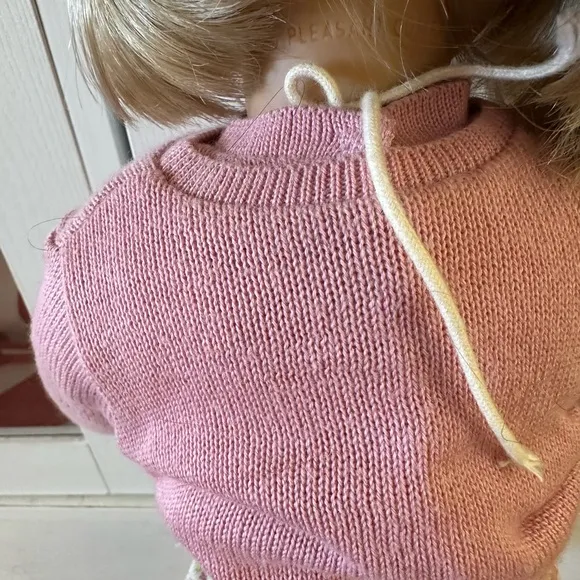 American Girl Doll in Pink Cardigan and Floral Skirt