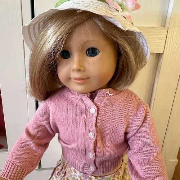 American Girl Doll in Pink Cardigan and Floral Skirt