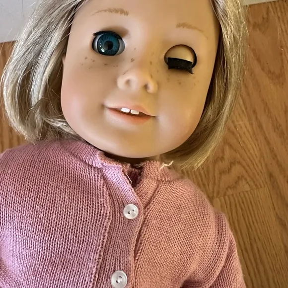 American Girl Doll in Pink Cardigan and Floral Skirt