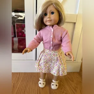 American Girl Doll in Pink Cardigan and Floral Skirt