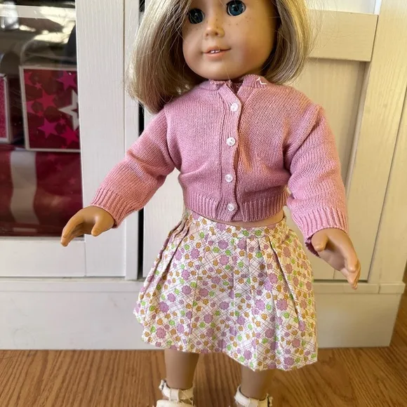 American Girl Doll in Pink Cardigan and Floral Skirt