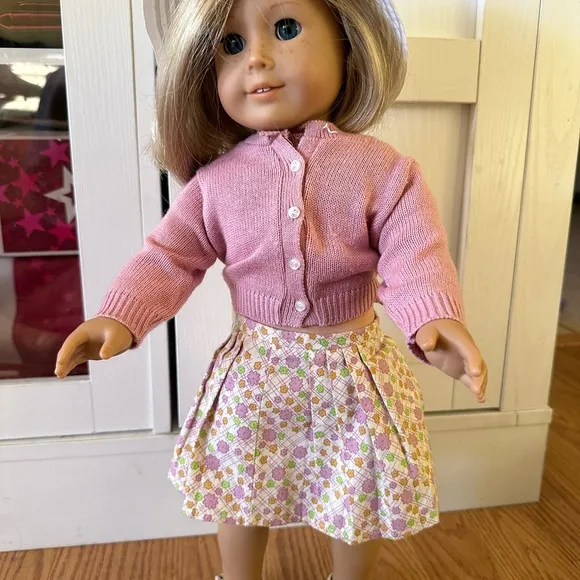 American Girl Doll in Pink Cardigan and Floral Skirt