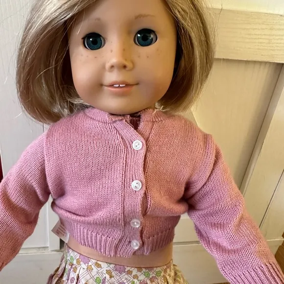American Girl Doll in Pink Cardigan and Floral Skirt