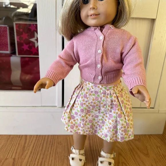 American Girl Doll in Pink Cardigan and Floral Skirt
