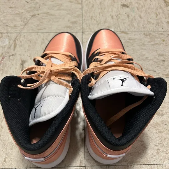 Black, white and peach high top shoes