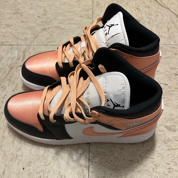 Black, white and peach high top shoes