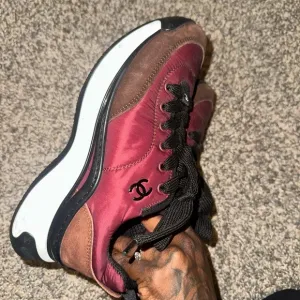Chanel woman’s Burgundy and Brown Sneakers