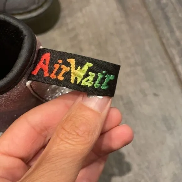 Dr. Martens rainbow colored boots