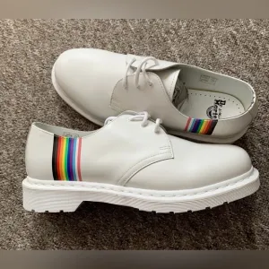 Dr. Martens White and Red Oxfords with Vibrant Accents
