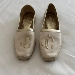 Jimmy Choo Gold and Cream Espadrilles with Elegant Design