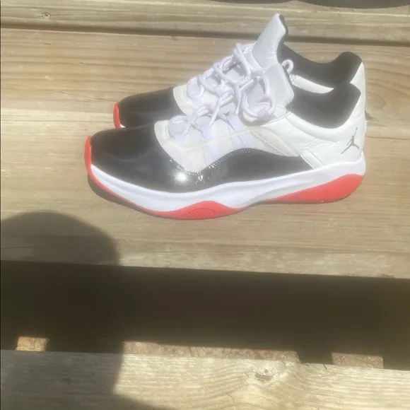Jordan 11s for men Black and White Athletic Shoes