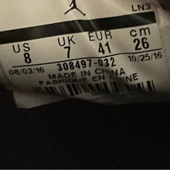 Jordan Black and Gold Athletic Shoes with Iconic Design