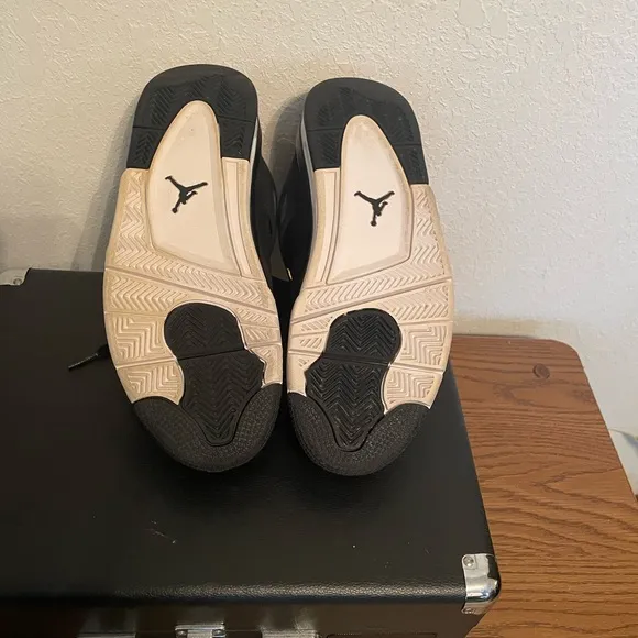 Jordan Black and Gold Athletic Shoes with Iconic Design