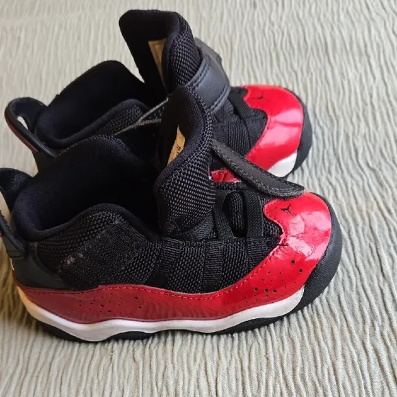 Kids Red and Black Nike Shoes