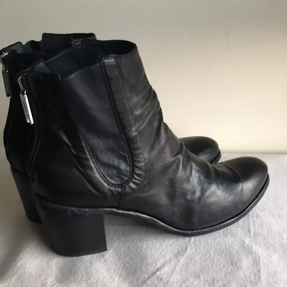 LeMarge booties Sz 41 black leather upper and sole. Quality leather construction
