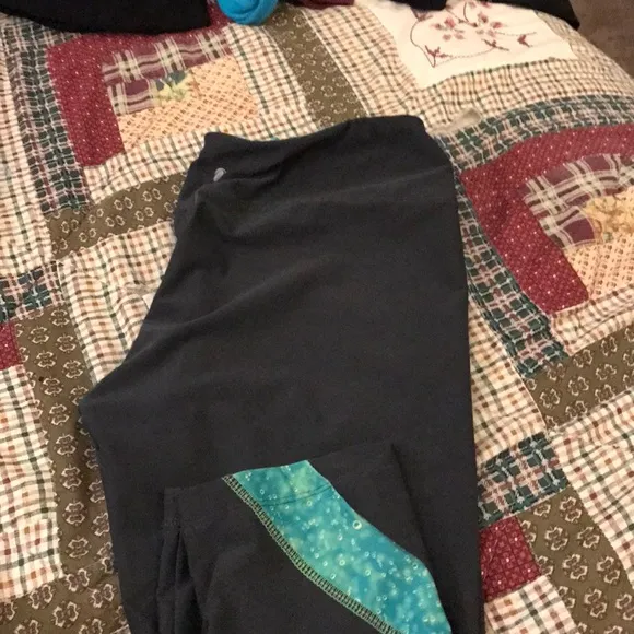 Levi jeans with a top and Converse shoes hoodie