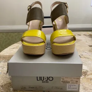 Lou-Jo - 4 1/2” platform sandals. Fabric platform, leather upper. Made i…