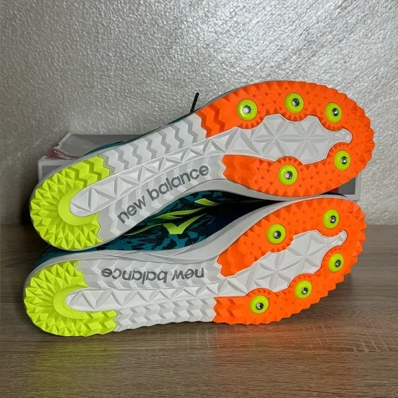 New Balance Women 12 Teal and Neon Yellow Running Shoes Spikes Sneakers