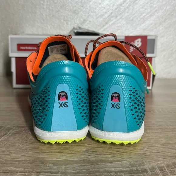 New Balance Women 12 Teal and Neon Yellow Running Shoes Spikes Sneakers