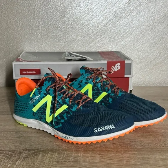 New Balance Women 12 Teal and Neon Yellow Running Shoes Spikes Sneakers