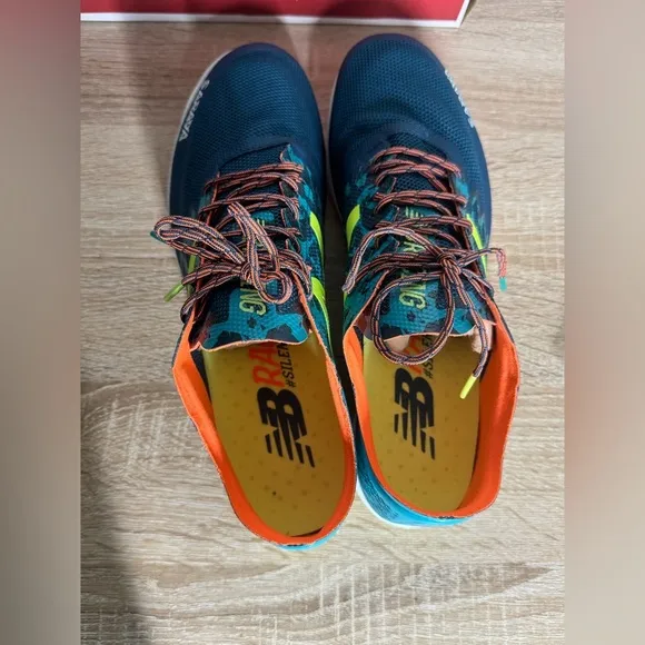 New Balance Women 12 Teal and Neon Yellow Running Shoes Spikes Sneakers