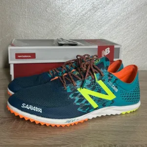 New Balance Women 12 Teal and Neon Yellow Running Shoes Spikes Sneakers
