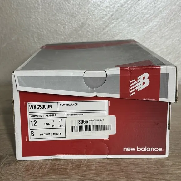 New Balance Women 12 Teal and Neon Yellow Running Shoes Spikes Sneakers