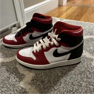 Nike Air Jordan 7s Red and Black Sneakers