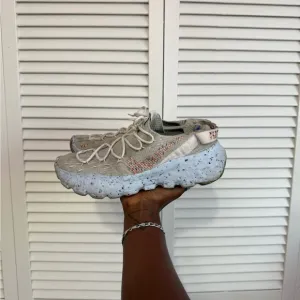 Nike Cream Athletic Shoes with Futuristic Design