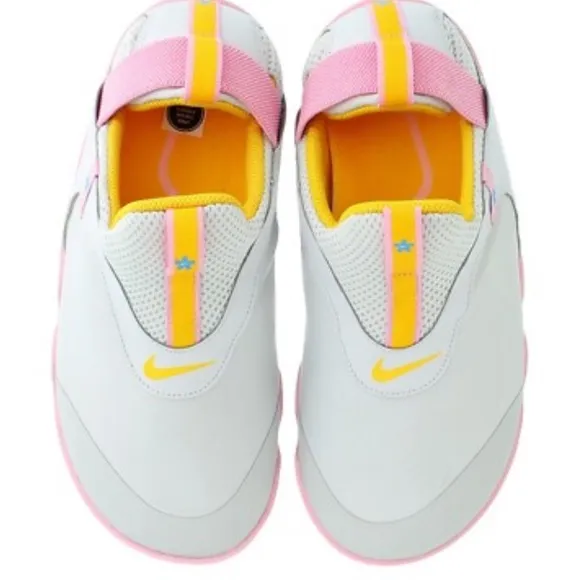 Nike Kids White and Pink Shoes zoom pulse