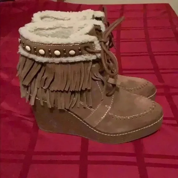 Sam Edelman women’s suede boots.