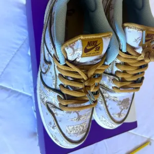 SB Dunks City with burgundy under the shoes