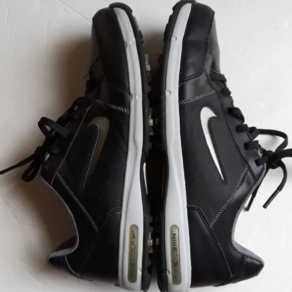 SIZE 5Y. NIKE black leather kids golf sneaker shoes.
