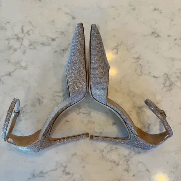 Stuart Weitzman &quot;Queen Helena&quot; high heel in a silver glitter finish. Size 9B EUC