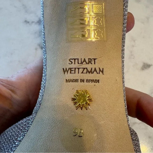 Stuart Weitzman &quot;Queen Helena&quot; high heel in a silver glitter finish. Size 9B EUC