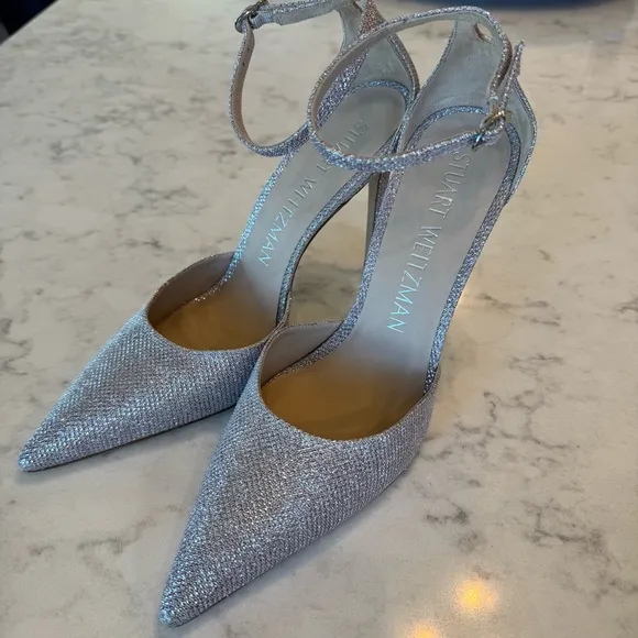 Stuart Weitzman &quot;Queen Helena&quot; high heel in a silver glitter finish. Size 9B EUC