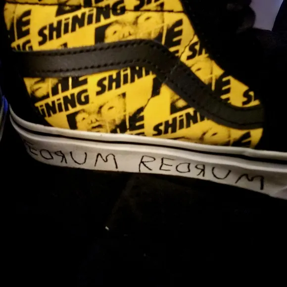 Vans Black and Yellow High-Top Sneakers with Bold Accents