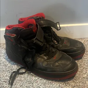 Vintage Black and Red Jordan High Top Sneakers