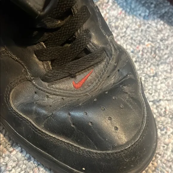 Vintage Black and Red Jordan High Top Sneakers